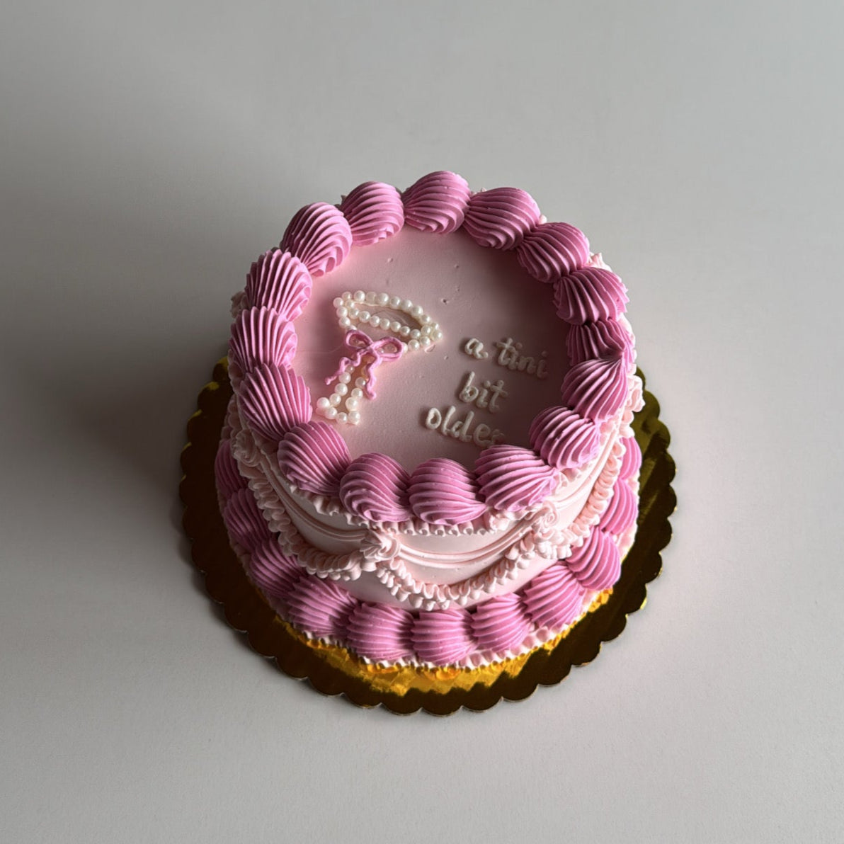 Pink martini themed cake with a pearl martini glass for a birthday in Montreal