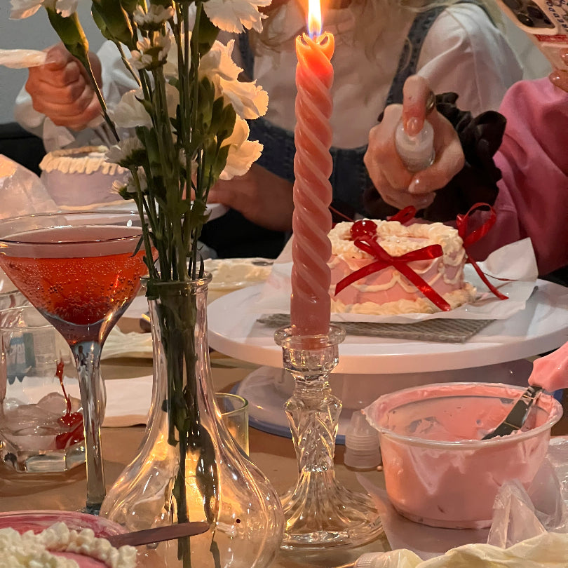 Cake decorating class setup with drinks and glitter during a cake & sip event in Montreal