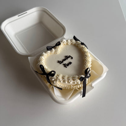 heart shaped bento cake with bows in Montreal