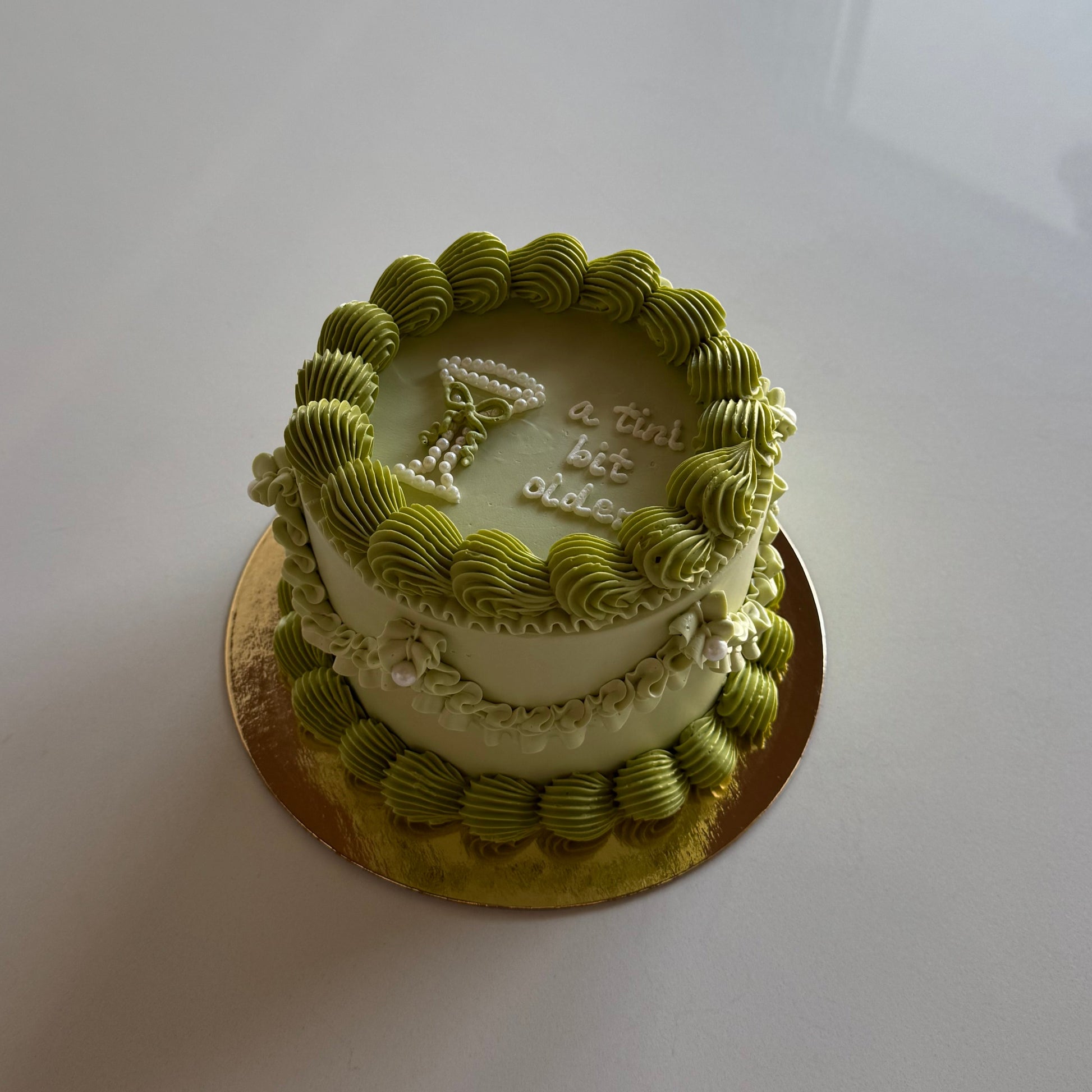 Olive martini themed cake with a pearl martini glass for a birthday in Montreal