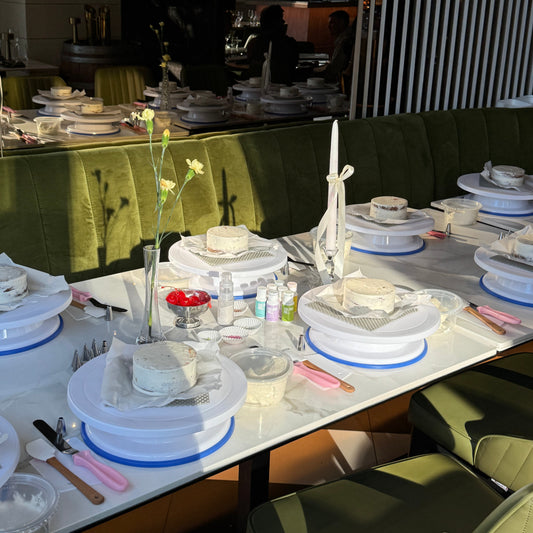 Cake decorating setup for a birthday party at Palma restaurant in Montreal